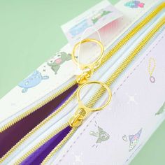 Have fun organizing your fave markers inside this pen case with two separate zippered sections! It’s also decorated with cute illustrations of Kuromi shopping with her sidekick, Baku! Made from synthetic leather Purple Pencil Case With Pen Slots As Gift, Cute Stationery With Pen Slots For Everyday Use, Purple Pencil Case With Zipper Closure As Gift, Multicolor Stationery With Pen Slots For Storage, Playful Bags With Pen Slots For Everyday Use, Playful Pencil Case With Pen Slots For Personal Use, Purple Stationery With Pen Slots For Everyday Use, Playful Pencil Case With Pen Slots For Daily Use, Kawaii Stationery With Pen Slots For Personal Use