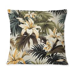 a white and yellow floral pillow on a white background with palm leaves in the foreground