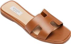 Brown Slides For Spring, Modern Brown Slides For Spring, Brown Spring Slides, Brown Open Heel Slides For Spring, Brown Flat Heel Slides For Spring, Casual Brown Open Heel Slides, Modern Brown Slides For Vacation, Modern Brown Flat Sandals, Cognac Open Toe Sandals For Summer