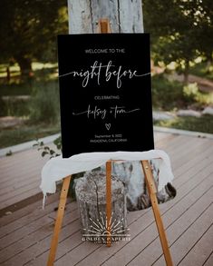 an easel with a sign on it that says welcome to the night before wedding