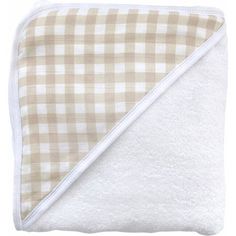 a white and brown checkered blanket folded up