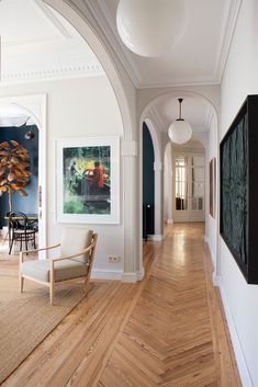 the hallway is clean and ready for guests to use it as an art gallery or office