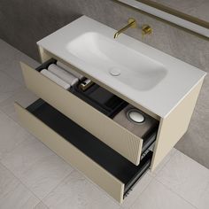 a white sink sitting on top of a counter next to a mirror