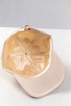 Protect your hair on the go with this classic beige satin lined baseball cap. Our baseball caps are available in 3 sizes to fit average size heads, larger heads, locs, and more! Finally wear a baseball cap that fits your head and protects your hair. Details: Entire interior of the hat is satin lined including the sweatband to protect your edges. High quality satin lining retains hair's moisture, prevents your hair from breakage, frizz, tangles, and drying out. Vegan and cruelty free. Color : Bei Hair Details, Moisturize Hair, New Era Cap, Baseball Caps, Locs, Your Head, Dad Hats, One Size Fits All, Cruelty Free