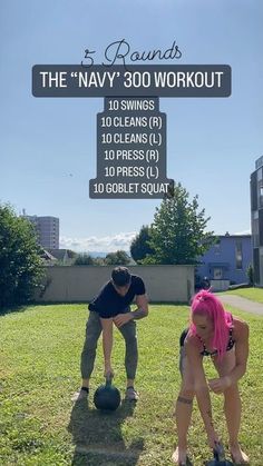 a man and woman standing in the grass with a ball on top of each other