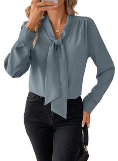 PRICES MAY VARY. Material:made from 100% Polyester,this blouse is crafted from a soft fabric that is incredibly lightweight and flowy,making it comfortable to wear all day Features:this casual blouse has a front bow tie knot style;long sleeves;a V-neckline;solid color;button cuffs.It is perfect for office ladies,makes you stand out in a crowd Matched:this blouse shirt is easy to pair with skirts;jeans;high waist shorts;high-heeled shoes;necklace and earrings,giving you a timeless and stylish look Occasion:perfect choice for a wide range of occasions,including daily life,vacation,holidays;travel;office or work settings;home;dates.It makes an ideal gift for friends;mom;wife or other family Package Content:one Women Tops.The tie neck blouse is available in sizes S-2XL.Garment Care:hand wash o Office Blouses For Women Work Outfits Business Attire, Nice Blouses For Women, Office Blouses For Women Work Outfits, Tie Knot Styles, Bow Tie Knot, Family Package, Skirts Jeans, Awesome Blouse, Jeans High Waist