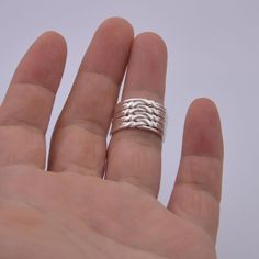 The 9 Band Ring is 100% handcrafted,It can be a great gift for a friend, family member or for yourself. We guarantee Sterling Silver quality.It's safe for people with sensitive skin!! ★ ★ ★ ★ ★Our jewelry made of 925 sterling silver with handmade. ★ ★ ★ ★ ★Orders need 3-5 business days to finished. ★ ★ ★ ★ ★ 100% SATISFACTION!Give FULL refund if you do not love it. How To Order: Please choose Ring Size when you order the ring. The item will come with a gift box,ready to be gifted. Thanks for vis Handmade Wide Band Stackable Rings As Gift, Wide Band Stackable Rings As Gift, Unique Wide Band Stackable Rings As Gift, Puzzle Ring, Not Love, Rings Cool, Personalized Rings, Sterling Silber, Band Ring