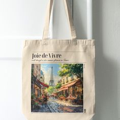 a tote bag hanging from the side of a door with an advertisement on it