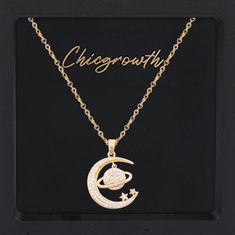 PRICES MAY VARY. 🪐Unique Design: The pendant of this necklace takes on the distinctive shape of the moon, suspending a lifelike Saturn with stars dotted around. Inspired by the mystical sights of the universe, this design takes your jewelry ensemble to a whole new level. Shimmering with mesmerizing light, it adds infinite charm to your appearance. 🪐High-quality: The saturn pendant necklace is crafted with high quality materials to ensure both durability and comfort. Each star and Saturn on the Saturn Pendant, Necklaces Trendy, Saturn Necklace, Dainty Necklaces, Compass Pendant, Compass Necklace, Coin Pendant Necklace, Necklace Flower, Womens Jewelry