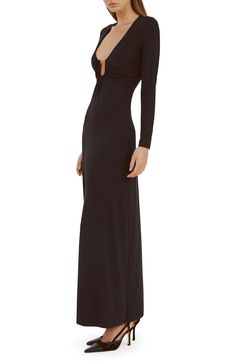 Be the center of attention in this sultry knit maxi designed with a plunging U-ring neckline surrronded by soft gathers. A stretchy body-contouring fabrication enchances its sleek silhouette. 57 1/2" length (size 4) Slips on over head Plunge neck Long sleeves Unlined 85% nylon, 15% elastane Hand wash, line dry Imported Ruched V-neck Maxi Dress For Night Out, V-neck Elastane Maxi Dress For Night Out, Evening Ruched V-neck Maxi Dress, Backless Elastane Maxi Dress, V-neck Evening Dress, Evening V-neck Elastane Dress, Stretch V-neck Elastane Maxi Dress, V-neck Bodycon Maxi Dress For Date Night, Bodycon Maxi Dress With Flattering Silhouette