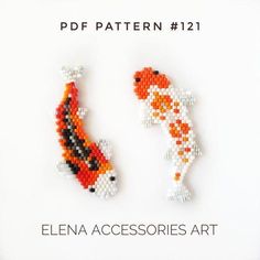 two beaded koi fish brooches sitting side by side on a white background