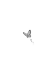 a black and white photo of a butterfly flying in the sky