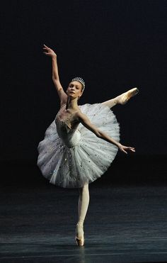 a ballerina in white tutu and tiara