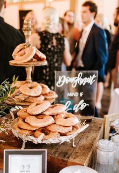 donuts stacked on top of each other at a wedding reception