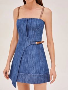 The Ferre Dress reimagines the timeless allure of denim in a chic and contemporary silhouette. This piece captures the essence of casual luxury, with its sleek, strap-suspended bodice and structured A-line skirt that create an air of effortless elegance. The rich indigo hue is complemented by subtle stitching details and a tasteful belt cinch, enhancing the waistline and adding a touch of sophistication. Model wears XS. Chic A-line Denim Blue Dress, Elegant Fitted Denim Blue Denim Dress, Fitted Denim Blue Denim Dress With Adjustable Straps, Denim Evening Dress For Spring, Evening Denim Dress For Spring, Elegant Spring Denim Mini Dress, Spring Evening Denim Dress, Chic Evening Denim Dress, Chic Denim Blue Mini Dress