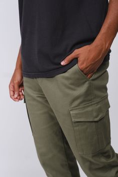 The Cargo Pocket Twill Jogger will be your new favorite pants to add to your wardrobe rotation. These joggers offer both comfy and durable styles. The fit is relaxed. Details include Pocket Twill Cargo Joggers, side pockets and elasticated drawstring waist Style: BFMI063F Cargo Joggers, Cargo Pocket, Jogger Shorts, Mens Outerwear, Hoodie Top, Sweatshirt Shirt, Jogger Pants, Swim Shorts, Short Pants