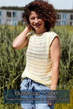 a woman standing in the middle of a field with her hand on her head and smiling