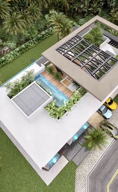 an aerial view of a modern house with pool