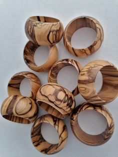 several wooden rings sitting on top of each other