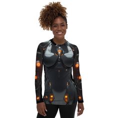 Embrace the future of fashion with the Women's Black Cyberpunk Robot Rash Guard, a perfect blend of edgy style and high-performance functionality. This sleek rash guard features a striking cyberpunk robot design set against a classic black backdrop, offering a bold, futuristic aesthetic. Engineered for maximum comfort and protection, it provides excellent UV defense and a snug, flexible fit ideal for surfing, swimming, or any intense water activity. Made from premium, quick-drying fabric, this rash guard ensures you stay cool and comfortable both in and out of the water. Make a statement and protect your skin with the Women's Black Cyberpunk Robot Rash Guard, where cutting-edge design meets superior performance. * 82% polyester, 18% spandex * 6.78 oz/yd² (230 g/m²) (weight may vary by 5%) Fitted Black Techwear Top, Futuristic Fitted Black Top, Fitted Futuristic Black Top, Futuristic Aesthetic, Black Backdrops, Robot Design, Water Activities, Rash Guard, Edgy Fashion