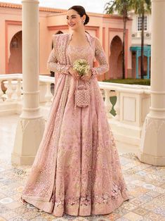 Brand: Faiza SaqlainCollection: Neorah by Faiza Saqlain Unstitched Wedding Festive Collection DESCRIPTION: Reflecting the sophistication of a floor sweeping silhouette, Ruzova is a celestial assemblage of time-honoured crafts. The powder pink net pishwas dazzles with intricately crafted tilla and sequin motifs delicately arranged in blooming floral patterns that are highlighted with every step. This piece comes with a silk churidar and an artistically adorned sheer net dupatta making it a true t Faiza Saqlain, Dupatta Style, Frock Style, Semi Formal Wear, Pakistani Wedding Dress, Chiffon Collection, Embroidered Bodice, Modest Wear, Silk Trousers