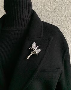 Classic Silver Lapel Pin For Party, Classic Silver Party Pins, Elegant Rhinestone Brooches For Anniversary, Silver Rhinestone Brooches For Gifts, Silver Rhinestone Brooches As Gifts, Silver Flower Shaped Lapel Pin Brooch, Elegant Silver Pins For Gifts, Silver Flower Lapel Pin, Silver Flower-shaped Brooches With Rhinestones