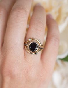 Planet ring set with Black Spinel – Ezmey Boutique Celestial Gemstone Rings, Mystical Round Halo Ring, Mystical Halo Ring For Promise, Planet Ring, Black Spinel Ring, Spinel Ring, Spinel Gemstone, Baguette Ring, Moss Agate Ring