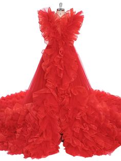 a red dress with ruffles on the bottom and back, is displayed against a white background