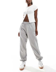 Sweatpants by adidas Originals For 'no plans' plans Elasticized waistband Side pockets Logo embroidery Elastic cuffs Regular, tapered fit Baggy Sweats, Cocktail Dress Formal, Adidas Sweatpants, Winter Party Dress, Sweaters And Leggings, Long Sleeve Floral Dress, Grey Adidas, Satin Slip Dress, Low Waisted