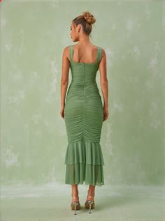 Eri Ruched Mesh Maxi Dress In Green The Eri Ruched Mesh Maxi Dress in a stunning green shade offers an elegant blend of sophistication and comfort. Its flowing maxi silhouette, adorned with delicate ruching and intricate mesh detailing, ensures you stand out at any event. Key Features Material: 100% Polyester for durability and easy care Closure Type: Invisible zipper opening at the back for a seamless look Fit: Designed to fit true to size with a non-stretch fabric ensuring your shape is perfec Mesh Maxi Dress, Jumpsuits And Romper, Pleated Fabric, Feather Dress, Gala Dresses, Maxi Dress Green, Embellished Dress, Ruffle Skirt, Shop Maxi Dresses