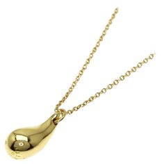 TIFFANY & Co. Elsa Peretti 18K Gold Teardrop Pendant Necklace Metal: 18K Yellow Gold Chain: 16" long Pendant: 12.5mm long Weight: 4.30 grams Hallmark: "©T&Co. PERETTI 750" on pendant, "TIFFANY&Co. 750 PERETTI" on chain tags Condition: Excellent condition, like new Authenticity Guaranteed Luxury Yellow Gold Drop Necklaces, 14k Yellow Gold Drop Necklace, Luxury Pear-shaped Yellow Gold Drop Necklace, Yellow Gold Teardrop Necklace With Polished Finish, Polished Teardrop Yellow Gold Necklace, Gold Pear-shaped Drop Necklace For Formal Events, Gold Pear-shaped Drop Necklace For Formal Occasions, Long Drop Yellow Gold Necklace For Formal Occasions, Pear-shaped Gold Drop Necklace For Formal Occasions