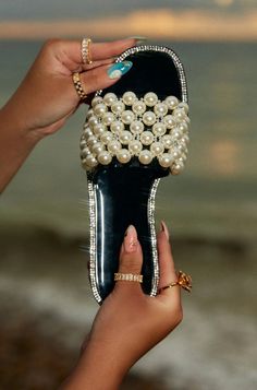 Elegant Beaded Flat Sandals, Chic Beaded Open Toe Sandals, Pearl Sandals For Summer Party, Black Beaded Sandals For Spring, Spring Black Beaded Sandals, Summer Party Pearl Sandals, Glamorous Pearl-embellished Sandals For Spring, Pearl Open Toe Sandals For Summer, Summer Pearl Open Toe Sandals