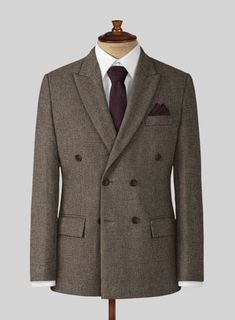 Sophisticated attire that doesn't sacrifice practicality in favor of elegance. Crafted from wool, our brown tweed suit is ideal for any occasion. Pair back your look with a white shirt and brown shoes to liven it up.     Look Includes  Dapper Brown Tweed Fabric  Double Breasted Jacket Style  Peak Lapel  Horn Brown Buttons  Single Vent  Three Cuff Buttons  Two welted back pockets on trousers    Click 'Customize Now' to modify the look if needed.   Lining: Viscose; Dry Clean. Semi-formal Notch Lapel Tweed Jacket, Formal Tailored Tweed Sport Coat, Tailored Tweed Sport Coat For Formal Occasions, Elegant Tweed Suit With Lapel Collar, Luxury Tweed Jacket With Herringbone Pattern For Business, Elegant Brown Tweed Jacket With Suit Collar, Elegant Brown Tweed Sport Coat, Luxury Brown Tweed Blazer, Elegant Tailored Brown Sport Coat