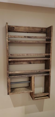 a wooden shelf hanging on the wall