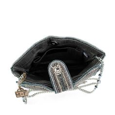 The perfect present, complete with a bow on top. This crossbody handbag is adorned with opulent rhinestones and beads and sure to match any outfit this holiday season. 8 x 1.5 x 8.5" Strap Length End to End: 49" Strap Drop: 22.5" Removable crossbody chain strap, magnet closure, inside pocket, back pocket, metal logo fob, protective storage bag, certificate of authenticity, fits a phone This is a handmade item, each one an individual work of art. Slight variations may occur. More Big Handbags, Mary Frances, Purse Gift, Mini One, Best Handbags, Handmade Purses, Top Handle Handbags, Be Present, Crossbody Clutch