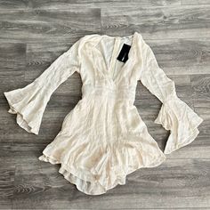 Ran Off White Romper Size Medium New Never Worn Tags Still Attached Fashion Nova Summer Long Sleeve Jumpsuits For Day Out, White Long Sleeve Summer Jumpsuit, Fitted Long Sleeve Summer Jumpsuit, White Long Sleeve Summer Jumpsuits And Rompers, Fitted Long Sleeve Summer Jumpsuits And Rompers, Summer Fitted Long Sleeve Jumpsuits And Rompers, White V-neck Jumpsuits And Rompers For Brunch, White Fitted Jumpsuits And Rompers For Spring, Chic Long Sleeve Jumpsuits For Summer