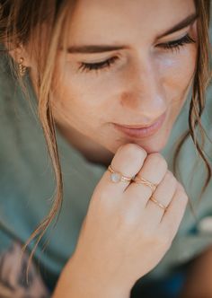 A versatile ring – rock this beauty three different ways! Two 1mm bands (hammered flat) that meet on the sides—united on top with wire wrapping. Available in 14kt Gold Fill + Sterling Silver. Jess pairs it with our Cigar Band, Dani Chain Ring, and two Confetti Rings. On her other hand, Jess is wearing our Dylan Chain Ring and Swell Ring. Jess B. styles it with our Charlie Bracelet, Confetti Bracelet, Goldie Bracelet and Confetti Ring. Handmade in Eau Claire, WI. Our jewelry is handmade so each p Stackable Double Band Promise Jewelry, Simple Adjustable Hammered Jewelry, Dainty Hand Forged Rings For Everyday, Adjustable Hammered Jewelry For Promise, Everyday Hand Forged Rose Gold Jewelry, Minimalist Everyday Wire Wrapped Jewelry, Minimalist Hand Wrapped Rose Gold Jewelry, Minimalist Hand Forged Adjustable Stackable Rings, Minimalist Hand Wrapped Promise Ring