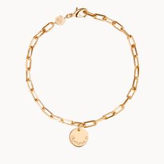 Our Dainty Love Links Bracelet is the perfect personalized bracelet for any occasion piece. Hand-engrave up to 14 characters and cherish the special memories forever.18K Champagne Gold Plated or 925 Sterling SilverChain length &amp; style: 7 Trace ChainCharm: 0.4 Diameter, 0.03 ThicknessCharms are not removable from this chainHand-engraved in our Paris workshopSent with love in a complimentary gift boxAny slight variations in lettering depth, spacing and alignment from the examples shown are Bracelet Love, Box Delivery, Personalized Bracelets, 925 Sterling Silver Chain, Champagne Gold, Hand Engraving, Chain Link Bracelet, Link Chain, Link Bracelets