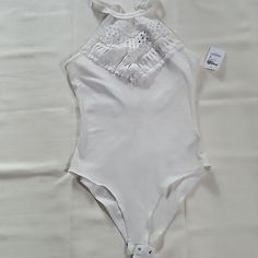 - All White Charlotte Russe Body Suit - Lace Like Stitching Print In Front - Brand New With Tag - Size Xs Fitted Bodysuit For Spring And Summer, Fitted Spring Beachwear Bodysuit, Feminine Fitted Bodysuit For The Beach, Feminine Fitted Bodysuit For Summer, Spring Feminine Beach Bodysuit, Fitted Feminine Bodysuit For Summer, Summer Fitted Halter Neck Bodysuit, Elegant Sleeveless Bodysuit For Beach Season, Fitted Halter Neck Summer Bodysuit