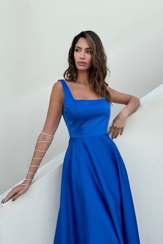 Chic and elegant midi length dress with wide straps in Electrician. The neckline decorated with rhinestones makes the dress really special. Will fit nicely to every body shape. Invisible Zip Fastener. Elegant Sleeveless Mini Dress For Prom Season, Elegant Sleeveless Mini Dress For Prom, Party Sleeveless Dress With Fitted Bodice And Straight Neckline, Square Neck Dresses For Gala And Prom Season, Elegant Midi Dress With Straight Neckline For Prom, Square Neck Dress For Gala During Prom Season, Sleeveless Midi Evening Dress For Prom Season, Sleeveless Midi Dress For Prom, Square Neck Satin Midi Dress For Party