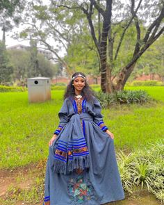 This gorgeous handwoven and embroidered garment showcases a magnificent combination of artistry, cultural heritage, and exquisite craftsmanship. This stunning piece is carefully crafted using Fetil, a type of cotton fabric, and thread material, resulting in a truly remarkable ensemble that radiates beauty and elegance. At the heart of this garment lies the handwoven Fetil fabric, carefully woven by skilled artisans using traditional techniques passed down through generations. Fetil cotton, known