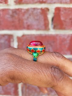 Beautiful 18k gold plated red stone bohemian ring. Detailed art featuring a red stone. Absolutely stunning piece!  Adjustable to fit preferred finger. Store in a dry and cool space. Vintage Statement Rings, Bohemian Style Rings, Goddess Ring, Boho Statement Ring, Gold Nose Hoop, Brass Bangle, Bohemian Rings, Jewelry Lookbook, African Jewelry