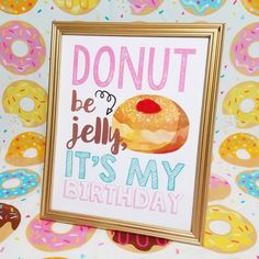 a sign that says donut be jelly it's my birthday with doughnuts in the background