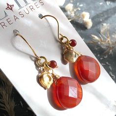 "6688 Carnelian Pearl Earrings Gold finish orange natural stone boho statement cluster dangle drops  birthday anniversary Valentine's day Mother's day Christmas stuffing stockings holiday gift for her women mom sister wife girlfriend daughter niece aunt grandma cousin colleague best friend. Enjoy the beauty & power of natural gemstones. MATERIALS & DIMENSIONS ✦ Natural CARNELIAN, orange red, faceted pears 16x16mm, round beads 4mm; ✦ Freshwater PEARLS, gold dyed, cornflake approx. 8x6mm; ✦ GOLD p Carnelian Dangle Earrings With Natural Stones, Carnelian Gemstone Dangle Earrings, Carnelian Drop Earrings With Natural Stones, Carnelian Natural Stones Dangle Earrings, Carnelian Natural Stone Drop Earrings, Orange Carnelian Dangle Earrings, Orange Dangle Earrings With Natural Stones, Carnelian Dangle Jewelry With Matching Earrings, Orange Gemstone Dangle Earrings