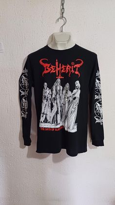 BEHERIT THE OATH OF BLACK BLOOD LONG SLEEVE SHIRT New Beherit Long Sleeve Shirt High Quality We'll shipping worldwide. Shipping time range. United States = 20-25 business days Rest of the world = 25-30 business days Gothic Long Sleeve T-shirt For Fall, Black Long Sleeve Shirt With Screen Print, Black Long Sleeve Halloween Shirt, Gothic Long Sleeve Cotton T-shirt, Gothic Long Sleeve Shirt For Halloween, Black Long Sleeve Band Merch T-shirt, Long Sleeve Halloween T-shirt For Alternative Fashion, Alternative Fitted Long Sleeve T-shirt, Alternative Style Long Sleeve Fitted T-shirt