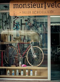 there is a bike that is in the shop window and it's on display