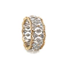 Eternelle ring, an exquisite design by Buccelatti. Handcrafted in 18k white gold set with diamonds and scalloped yellow gold borders. Finger size 7 ul { list-style-type: square; } Luxury White Gold Diamond Ring With Intricate Design, Luxury Wedding Filigree Ring With Single Cut Diamonds, Luxury Filigree Ring With Single Cut Diamonds For Wedding, Gold Filigree Ring With Brilliant Cut In Luxury Style, Elegant Gold Filigree Ring With Brilliant Cut, Elegant Gold Filigree Ring With Single Cut Diamonds, Gold Filigree Ring With Single Cut Diamonds, Luxury White Gold Filigree Ring, Elegant Yellow Gold Filigree Ring With Diamond Accents