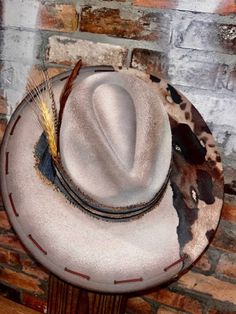 **Variations in materials used due to each hat being custom hand made. Design of hat will remain as close to original as possible** 100% polyester One Size Fits MOST. If you do not see a style you like, shoot us a message and we will try to create your vision!! Burnt Hats, Burned Hats, Charlie 1 Horse Hat, Cowboy Hat Design, Custom Cowboy Hats, Brown Cowboy Hat, Black Cowboy Hat, Country Hats, Mens Hats Fashion