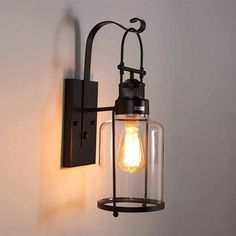 a light that is on the wall with a bulb attached to it's side