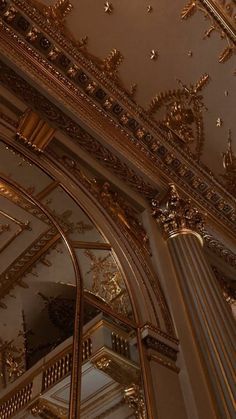 an ornately decorated ceiling in a building